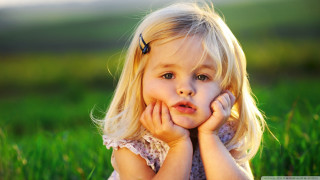 Little girl grass hands face 2 - the camera free wallpaper