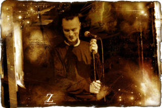 Man holding microphone sitting microphone - deep shadow free wallpaper