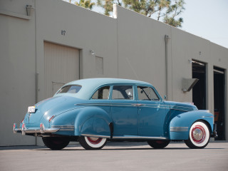 Blue car parked building garage - a garage door open free wallpaper