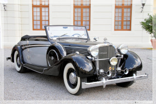 Black car parked building white - an art deco painting free wallpaper for desktop