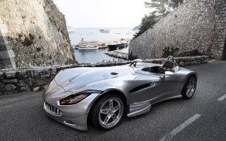 Silver sports car street water - a silver sports car free wallpaper
