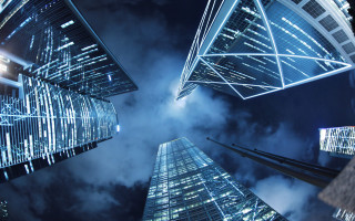 Skyscrapers nighttime sky background clouds - deconstructivism free wallpaper