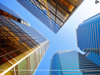 Tall buildings city blue sky - window free wallpaper for desktop