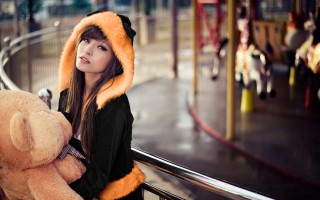 Woman hooded jacket teddy bear - jacket holding free wallpaper