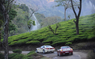 Cars parked road hillside waterfall - beautiful scene free wallpaper