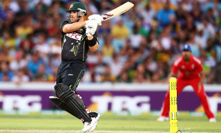 Man black uniform swinging bat - ball free wallpaper for desktop