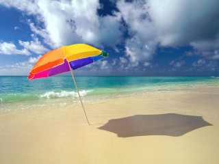 Rainbow umbrella beach blue sky - a shadow of a person free wallpaper