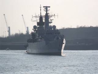 Large ship sailing water shoreline - anamorphic free wallpaper