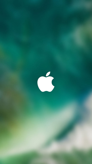Blurry apple logo green background - free technology wallpaper for mobile
