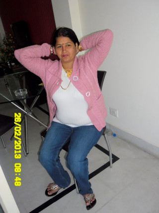 Woman sitting pink jacket denim - single free wallpaper