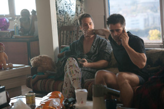 Two men couch talking cell - a teddy bear free wallpaper