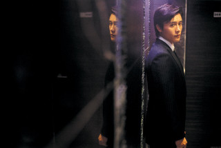 Man suit mirror room door - another man in the background free wallpaper