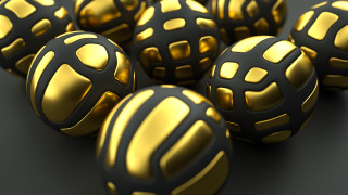 Shiny gold balls black surface - image free wallpaper