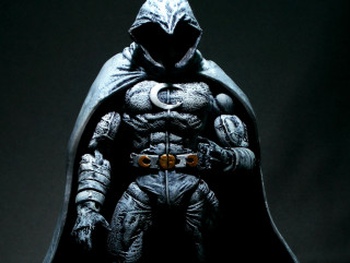 Statue man batman costume hood - concrete art free wallpaper