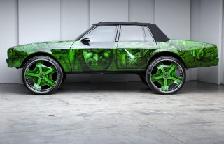 Green car green design wheels - a garage free wallpaper