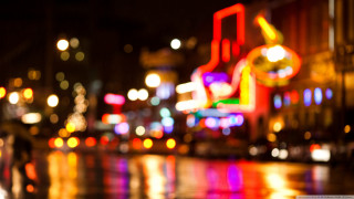 Blurry city street night lights 7 - a blurry photo of a city street free wallpaper