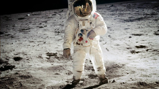 Astronaut walking moon helmet space - free space wallpaper