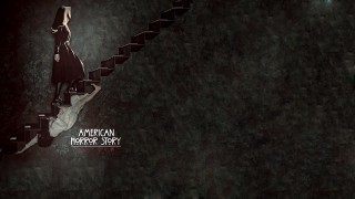 Woman walking stairs dark room - a stair case free wallpaper