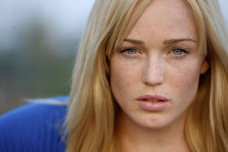 Woman freckled hair blue eyes - hair free wallpaper