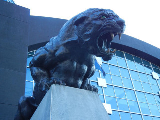Lion bronze sculpture glass building - sculpture free wallpaper