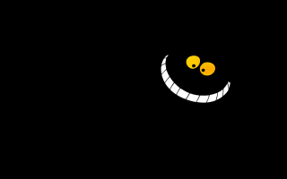 Black background smiley face yellow - a smiley face free wallpaper
