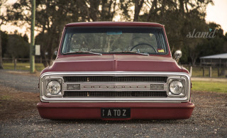 Red truck gravel road forest - a red truck free wallpaper