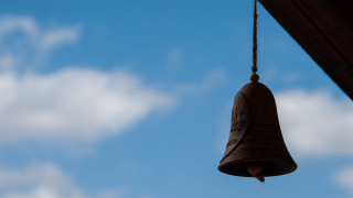 Bell wooden roof sky background - a bell free wallpaper