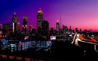 City skyline purple sky night - a few light free wallpaper