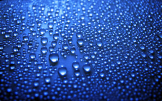 Water droplets blue surface macro 9 - a blue surface free wallpaper