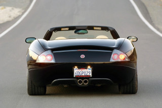 Black sports car driving road 3 - a license plate free wallpaper