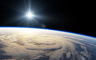 Satellite view hurricane from space - shining free wallpaper