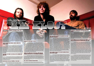 Two men red couch red - a red wall behind them free wallpaper