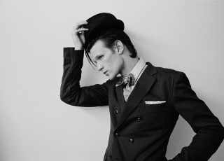 Man suit hat leaning wall - beautiful bone structure free wallpaper