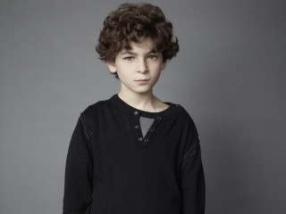 Young boy black shirt gray - a young boy free wallpaper for desktop