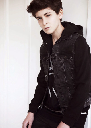 Young man black jacket leaning - a young man free wallpaper