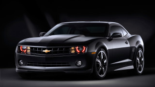 Black chevrolet camaro dark room 2 - a spotlight free wallpaper