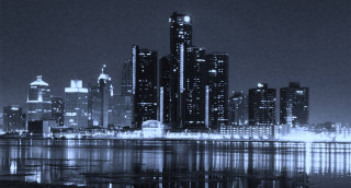 City skyline night lake reflection - a lake in front free wallpaper