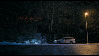 Car parked snowy street night - a street light free wallpaper