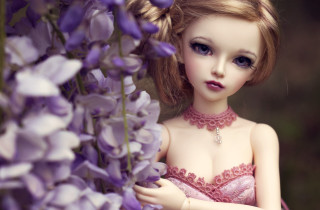 Doll pink dress purple flowers - her hand and a necklace free wallpaper
