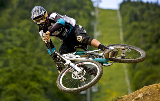 Man bike mountain jump air - a bike free wallpaper