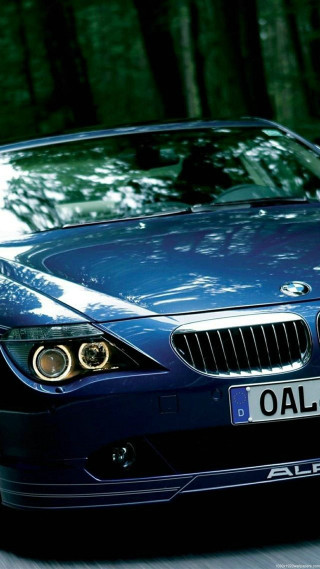 Blue car driving street forest - free cars wallpaper for mobile