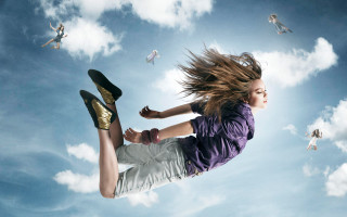 Woman flying skateboard blue sky - white cloud free wallpaper for desktop