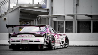 Pink car parked building staircase - a staircase in the background free wallpaper