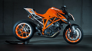 Motorcycle orange rims wheelie side - dosso dossi free wallpaper