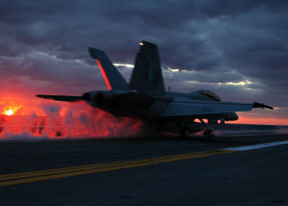 Jet spraying water runway sunset - a jet free wallpaper
