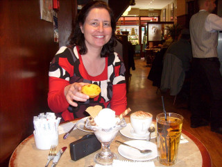 Woman sitting table food drinks - frances jetter free wallpaper