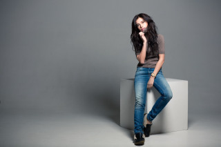 Woman sitting concrete block posing - contemporary free wallpaper for desktop