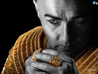 Man gold outfit holding ring - chafik charobim free wallpaper