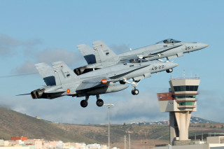 Fighterjet takeoff controltower mountain ocean - an airport runway free wallpaper