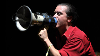 Man red shirt megaphone yelling - ignacio fernandez rio free wallpaper